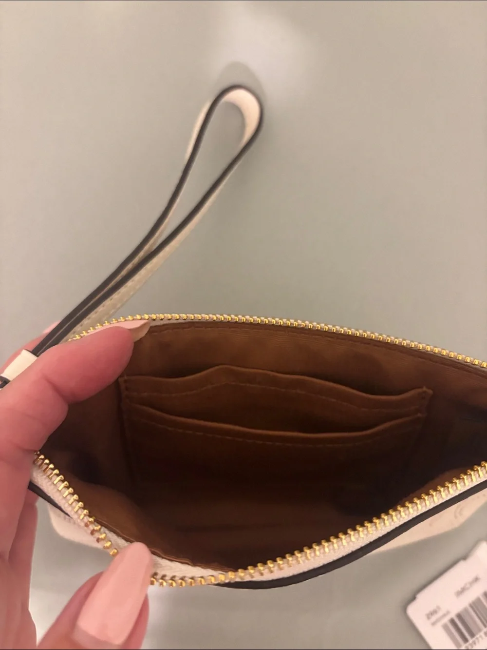 Coach Perforated Signature Leather Wristlet in Cream with Gold Hardware